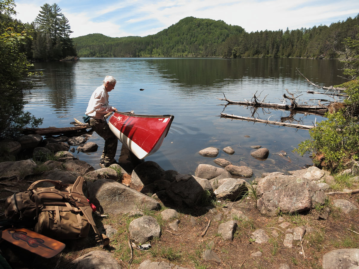 Launching the canoe into Laurel Lake in Algonquin Park