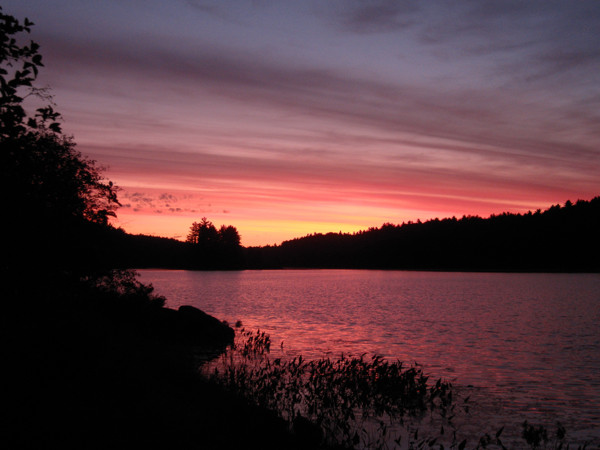 red sunrise on Catfish Lake in Algonquin Park