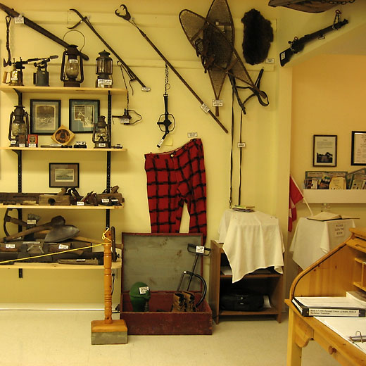 Red checked wool pants in the School House Museum at Meilleurs Bay near Point Alexander