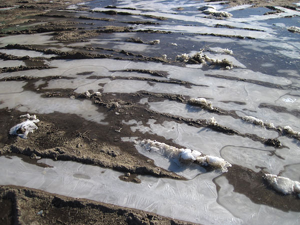 ah spring  ice and frozen mud