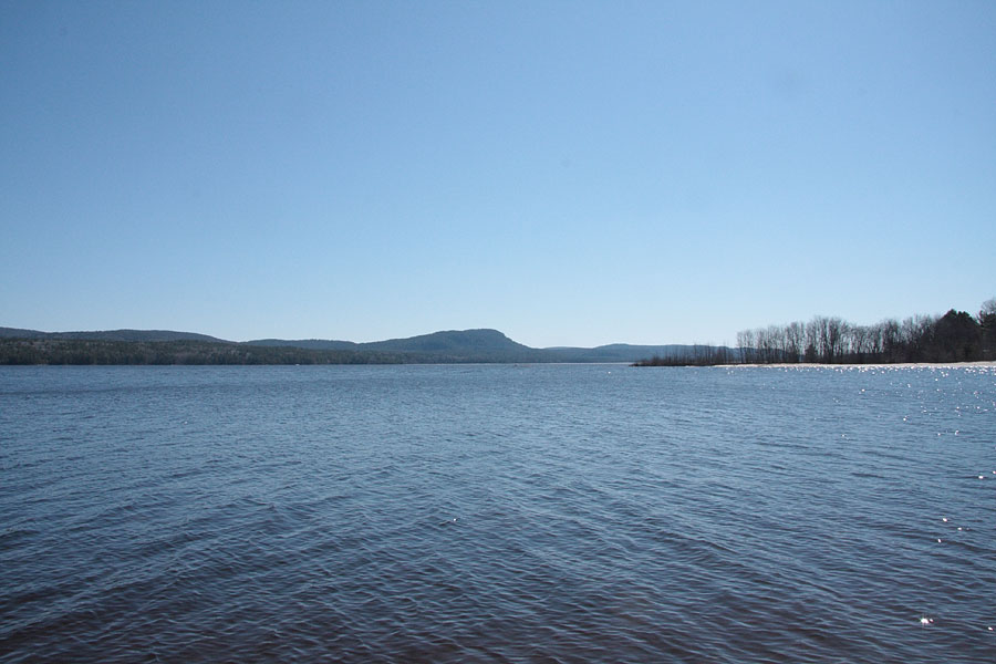 Mount Martin as seen from Burkes Beach on the Ottawa River at Point Alexander at ice out