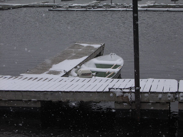 boat in snow at Deep River Pier