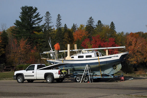 putting away sailboat at Deep River Pier